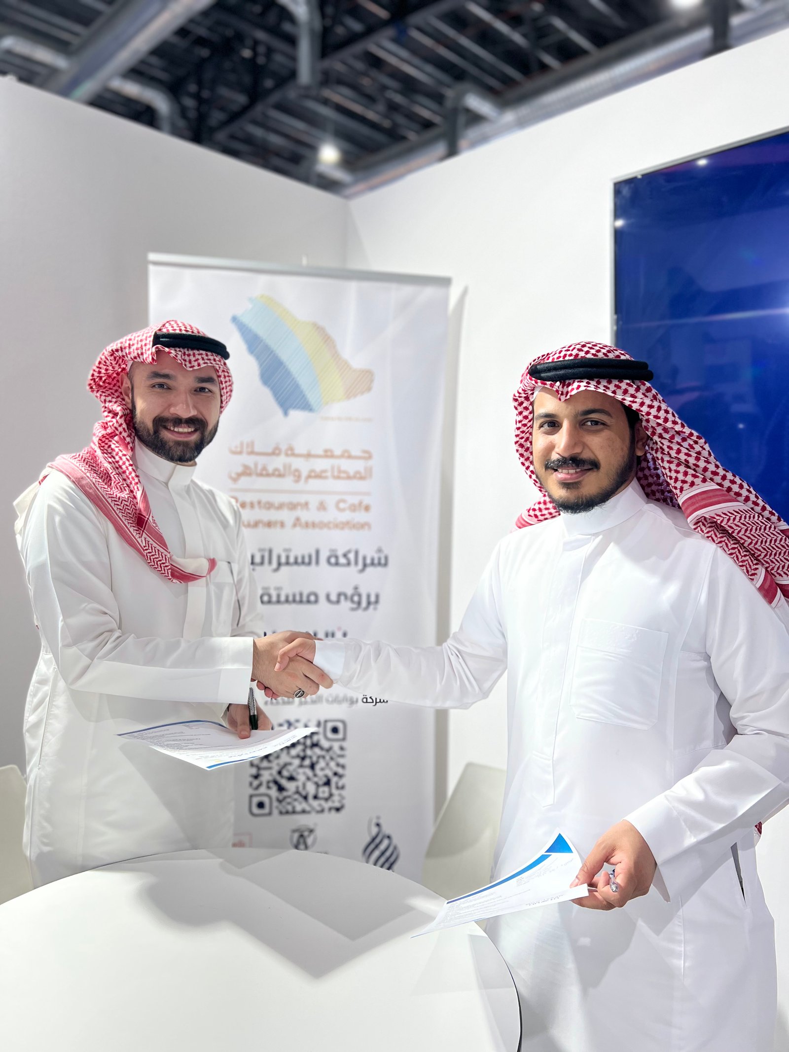 Low angle view up into a sky filled with deep blue clouds. 