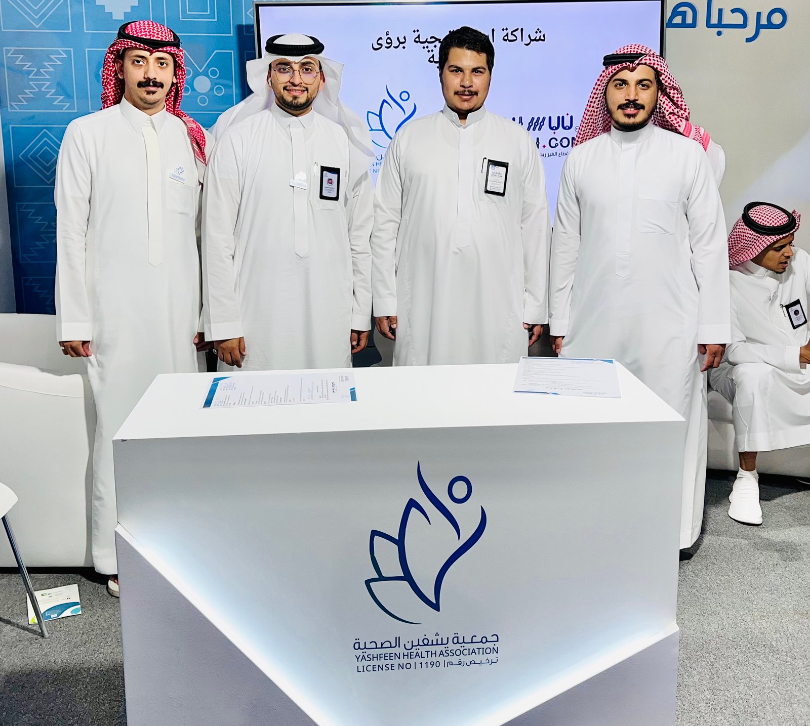 Low angle view up into a sky filled with deep blue clouds. 