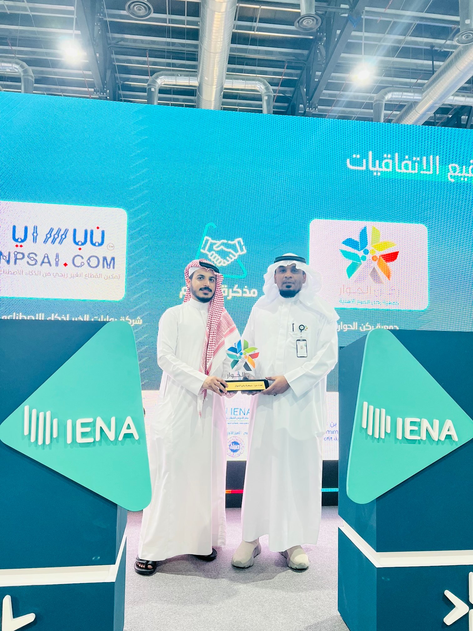 Low angle view up into a sky filled with deep blue clouds. 