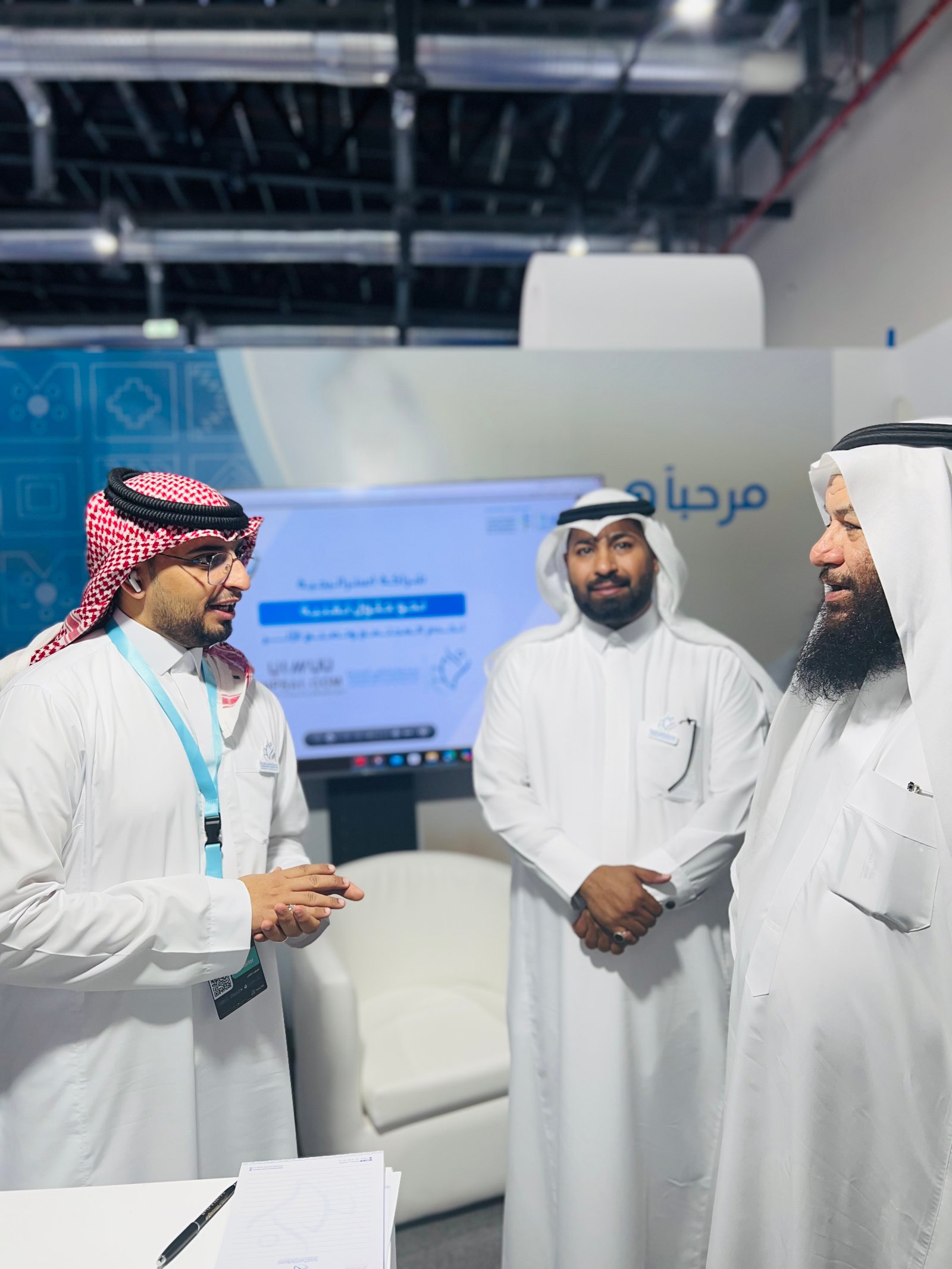 Low angle view up into a sky filled with deep blue clouds. 