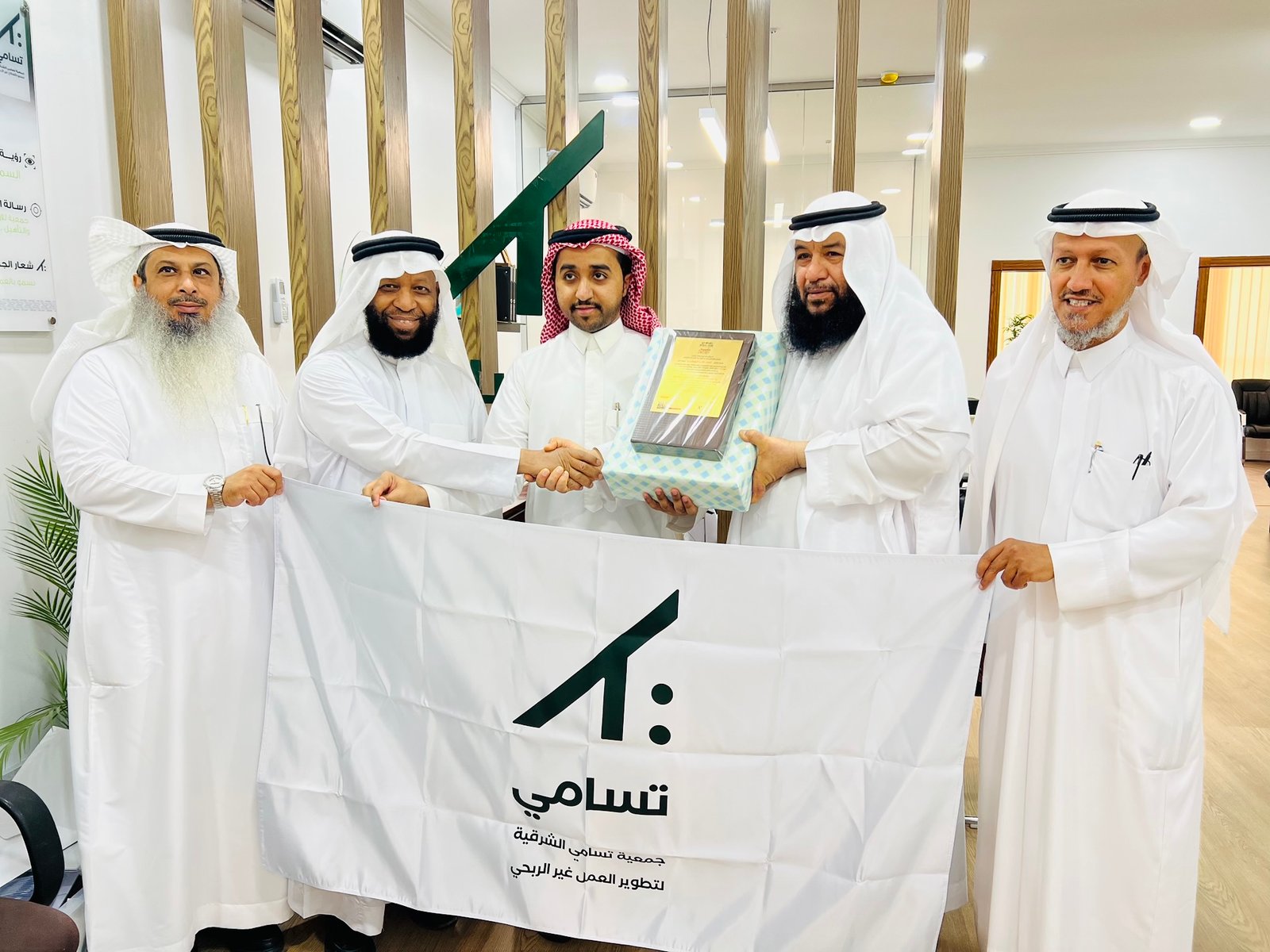 Low angle view up into a sky filled with deep blue clouds. 