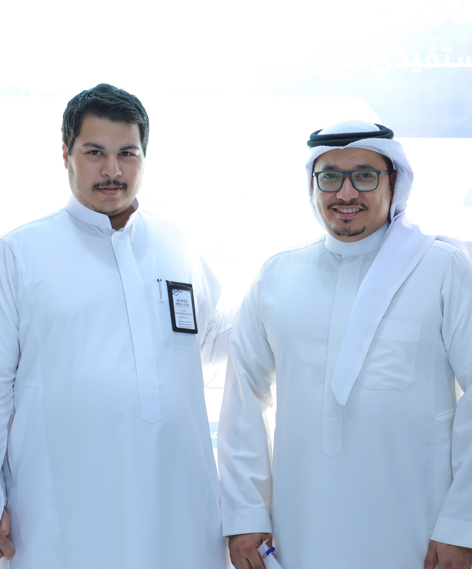 Low angle view up into a sky filled with deep blue clouds. 